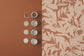 124145 - Shadow Play Wallpaper - Clay - Graham & Brown